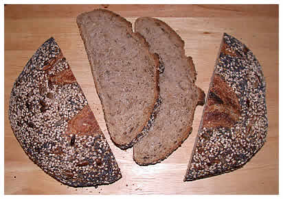 sliced loaf of 3-seed whole wheat bread from Companion Bakers