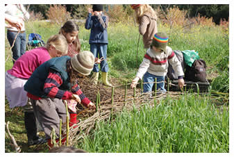 Kids working in LEF's demonstration garden