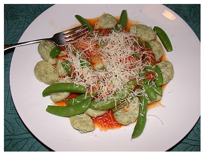 Ricotta-dill gnocchi with sugar snap peas and garlic-lemon-butter-tomato sauce