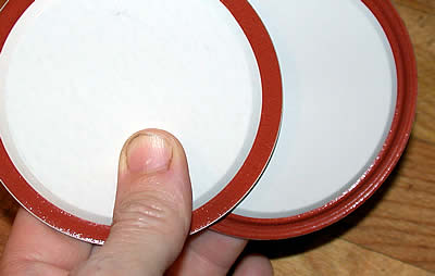 Difference between new and used canning lids