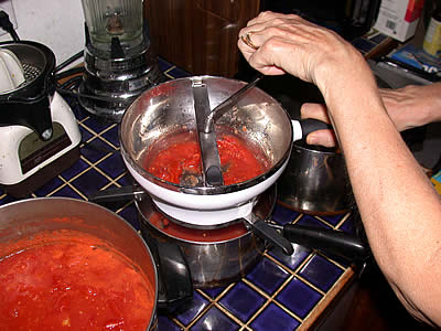 Crank the mill to separate pulp from skins and seeds