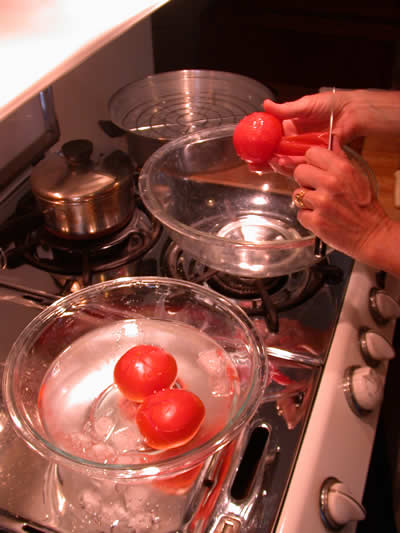 Peeling skin from the tomato