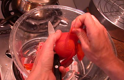 Peeling tomato skin (closeup)